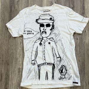 Volcom White Graphic Short Sleeve Tee Slim Medium has a couple of small stains